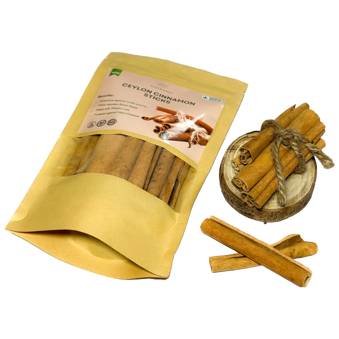 Pack of high-quality Ceylon cinnamon sticks in a bag with loose sticks on a wooden dish.